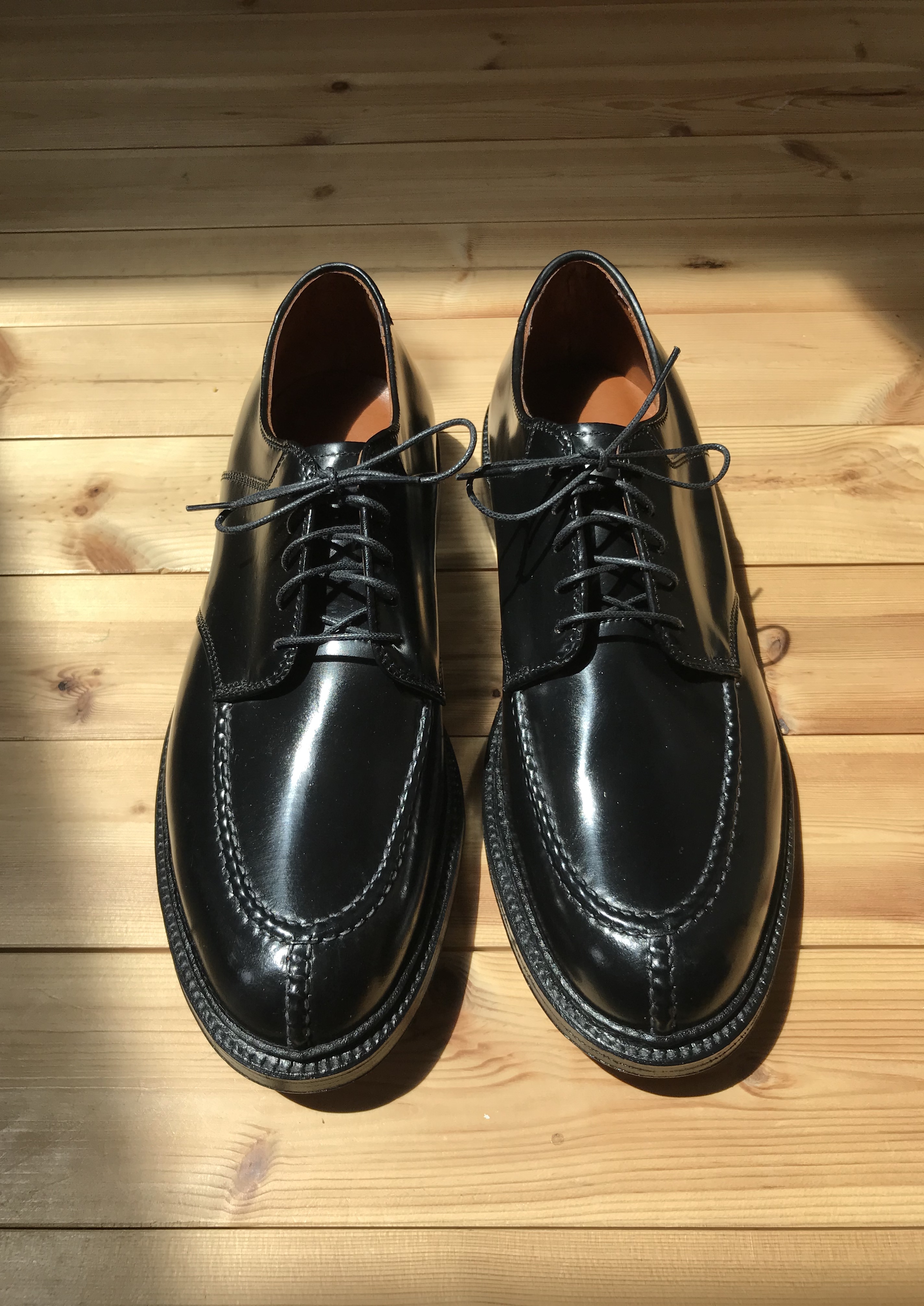 cordovan and black saddle shoes