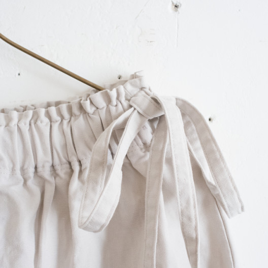 one side slit long skirt／cotton linen〈ivory〉 | SALUÉ